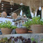 terrasoverkapping met plantenbakken